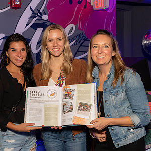 3 women Innovate Miami Launch holding Innovate Miami book