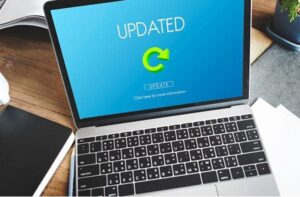 Laptop displaying software update complete screen.