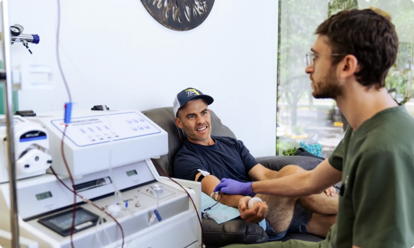 Patient receiving clinician-supervised treatment at a longevity clinic